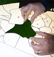 Placing the cut piece onto the pattern